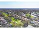 Aerial view of a residential community, with golf course, lakes, and manicured lawns at 5245 88Th E St, Bradenton, FL 34211