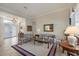 Inviting formal living area with elegant furnishings, chandelier, and views of the outdoors at 5245 88Th E St, Bradenton, FL 34211