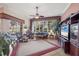 Bright and airy Gathering room with multiple windows and a view of the pool at 5245 88Th E St, Bradenton, FL 34211