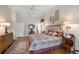 Comfortable main bedroom with a ceiling fan and hardwood floors at 5245 88Th E St, Bradenton, FL 34211