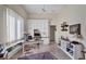 Home office with neutral walls, lots of built-in storage, a ceiling fan, and tiled floors at 5245 88Th E St, Bradenton, FL 34211