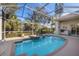 Screened in pool with hot tub and landscaping at 5245 88Th E St, Bradenton, FL 34211