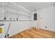 Unfinished basement area with shelving and laundry hookups at 5411 16Th W St, Bradenton, FL 34207