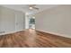 Bright bedroom with wood-look floors and sliding glass door at 5411 16Th W St, Bradenton, FL 34207