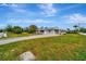 Ranch style home with large yard and long driveway at 5411 16Th W St, Bradenton, FL 34207