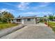 Updated home with covered patio, driveway, and landscaping at 5411 16Th W St, Bradenton, FL 34207