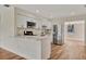 Modern kitchen featuring white cabinets and stainless steel appliances at 5411 16Th W St, Bradenton, FL 34207