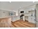 Modern kitchen with white cabinets and stainless steel appliances at 5411 16Th W St, Bradenton, FL 34207