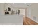 Modern kitchen featuring white cabinets and stainless steel appliances at 5411 16Th W St, Bradenton, FL 34207