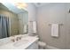 Clean bathroom with a shower/tub combo, vanity, and updated fixtures at 5560 Cannes Cir # 3-106, Sarasota, FL 34231
