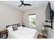 Comfortable bedroom with a queen-size bed and large window at 5560 Cannes Cir # 3-106, Sarasota, FL 34231