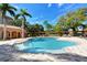 Community pool with plenty of lounge chairs at 5560 Cannes Cir # 3-106, Sarasota, FL 34231