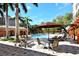 Resort-style pool with ample deck space and lounge chairs at 5560 Cannes Cir # 3-106, Sarasota, FL 34231
