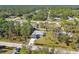 Single-story house in a wooded neighborhood at 5629 Crenshaw Ln, North Port, FL 34286