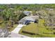 Single-story house with driveway and large yard at 5629 Crenshaw Ln, North Port, FL 34286