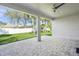 Spacious covered patio with a view of the backyard at 5629 Crenshaw Ln, North Port, FL 34286