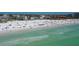 Aerial view of beachfront property with resort-style amenities at 6144 Midnight Pass Rd # 2N, Sarasota, FL 34242