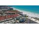Aerial view of resort community near beach; various buildings and beach visible at 6144 Midnight Pass Rd # 2N, Sarasota, FL 34242