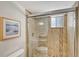 Clean bathroom with granite countertop, modern vanity, and a large mirror at 6144 Midnight Pass Rd # 2N, Sarasota, FL 34242