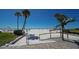 Beach access with boardwalk leading to sandy beach at 6144 Midnight Pass Rd # 2N, Sarasota, FL 34242