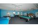Community game room with pool table, ping pong, air hockey, and seating at 6144 Midnight Pass Rd # 2N, Sarasota, FL 34242