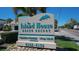 Island House Beach Resort signage; features vacation rental info and contact number at 6144 Midnight Pass Rd # 2N, Sarasota, FL 34242