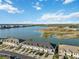 Aerial view of townhouses near a lake at 6404 Silverstar Dr, Sarasota, FL 34240