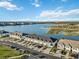Aerial view of townhouses by the lake at 6404 Silverstar Dr, Sarasota, FL 34240
