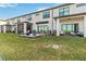 Private backyard with patio and grassy area at 6404 Silverstar Dr, Sarasota, FL 34240