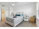 Bright bedroom with a comfy bed, nightstand, and ample closet space at 6404 Silverstar Dr, Sarasota, FL 34240