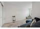 Bright bonus room with sectional sofa and window at 6404 Silverstar Dr, Sarasota, FL 34240