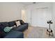 Spacious bonus room with sectional sofa and closet at 6404 Silverstar Dr, Sarasota, FL 34240