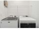 Laundry room with side-by-side washer and dryer at 6404 Silverstar Dr, Sarasota, FL 34240