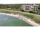Aerial view of building near lake and golf course at 6450 Watercrest Way # 303, Lakewood Ranch, FL 34202