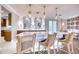 Community bar with white countertop and rattan barstools at 6450 Watercrest Way # 303, Lakewood Ranch, FL 34202
