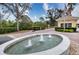Gated entrance with fountain and landscaping at 6450 Watercrest Way # 303, Lakewood Ranch, FL 34202