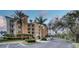 Building exterior with palm trees and parking at 6450 Watercrest Way # 303, Lakewood Ranch, FL 34202