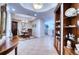 Elegant foyer with view into dining room and kitchen at 6450 Watercrest Way # 303, Lakewood Ranch, FL 34202
