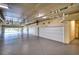 Shared parking garage with multiple garage doors at 6450 Watercrest Way # 303, Lakewood Ranch, FL 34202