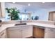 White kitchen with stainless steel appliances at 6450 Watercrest Way # 303, Lakewood Ranch, FL 34202