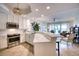 Modern kitchen with white cabinets and island at 6450 Watercrest Way # 303, Lakewood Ranch, FL 34202