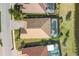 Aerial view of single Gathering home with pool and landscaped yard at 7014 Whittlebury Trl, Lakewood Ranch, FL 34202