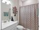 Clean bathroom with shower, toilet and white vanity at 7014 Whittlebury Trl, Lakewood Ranch, FL 34202