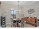 Casual dining area with table and chairs near a buffet at 7014 Whittlebury Trl, Lakewood Ranch, FL 34202