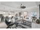 Open concept living room with a view of the kitchen and dining area at 7014 Whittlebury Trl, Lakewood Ranch, FL 34202