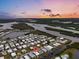 Aerial view showing home's waterfront location and community at 716 Blackburn Blvd, North Port, FL 34287
