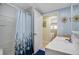 Bathroom with shower, vanity, and access to bedroom at 716 Blackburn Blvd, North Port, FL 34287