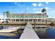 Community clubhouse with waterfront views and boat docks at 716 Blackburn Blvd, North Port, FL 34287