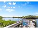 Scenic fishing dock overlooking the calm water at 716 Blackburn Blvd, North Port, FL 34287