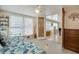 Guest bedroom with daybed, access to another room, and built-in dresser at 716 Blackburn Blvd, North Port, FL 34287